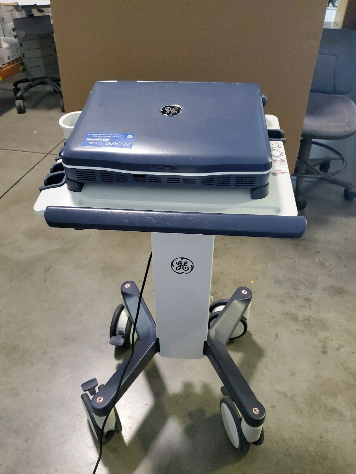 GE Logiq V2 Portable Ultrasound System with Cart and all options on. DIAGNOSTIC ULTRASOUND MACHINES FOR SALE