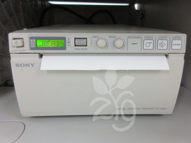 a white dishwasher sitting on top of a counter